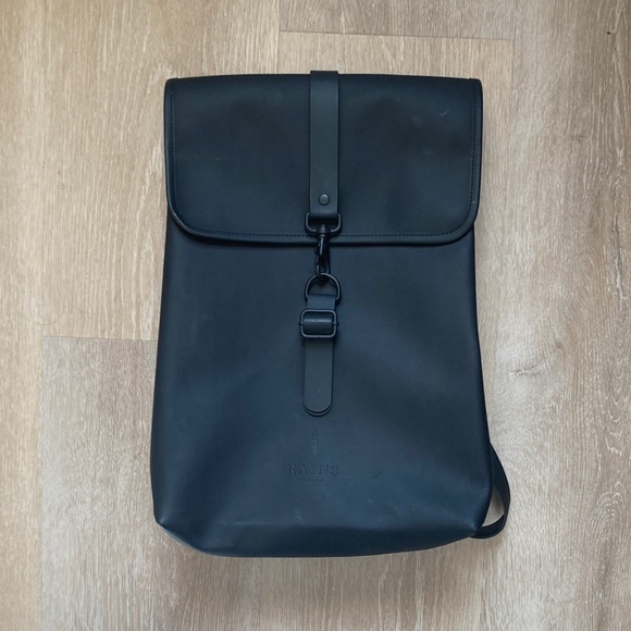 Rains waterproof black backpack
